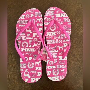 Victoria's Secret Pink Flip Flops with White Design